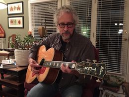 Playing Tex Ritter’s guitar