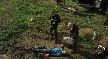 Robert David Hall, George Eads, and Aidan Gould in CSI: Crime Scene Investigation (2000)