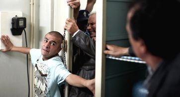 Hippolyte Girardot and Aymen Saïdi in Top Floor Left Wing (2010)