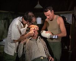 Harvey J. Goldenberg, Larry Linville, and McLean Stevenson in M*A*S*H (1972)