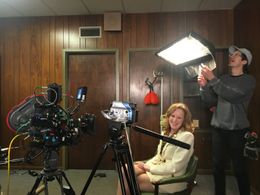 Caroline Carter big laughs behind the scenes on the set of a music video