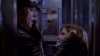 Rip Torn and Shawn von Schreiber in A Stranger Is Watching (1982)