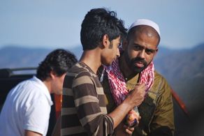 Eliezer Ortiz as Bashir with the Director Faizan Kareem on the set of the film The Knowing of Ali.