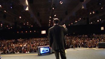 Ray Kurzweil addresses an audience in Milan in Transcendent Man.