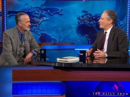 Hooman Majd and Jon Stewart in The Daily Show (1996)