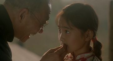 Shu Chen and Qianquan Yang in Shanghai Triad (1995)