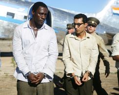 Idris Elba and Riaad Moosa in Mandela: Long Walk to Freedom (2013)