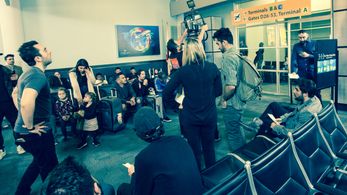 Directing a big crowd for an airport terminal set on La Fouine's music video