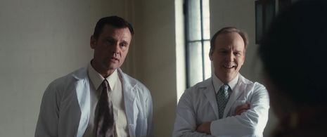 Michael Coady as Dr. Percy with Victor Cornfoot as Dr. Burns in Eaux Troubles (Broken Waters)