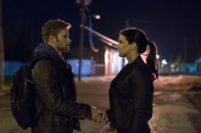 Kellan Lutz and Gina Carano in Extraction (2015)