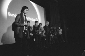 Director Brad Besser and the cast and crew of 