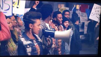 Logan Browning and Darren Lee Campbell in Dear White People (2017)