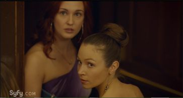 Dominique Provost-Chalkley and Katherine Barrell in Wynonna Earp (2016)