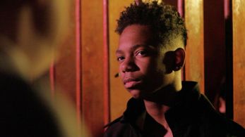 Little Homie being confronted by Dectective Goretri and Daniels in Mahammad’s club.