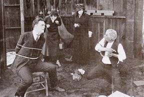 Charles Cummings, Ollie Kirby, Thomas G. Lingham, Marin Sais, and William H. West in The Strangler's Cord (1915)