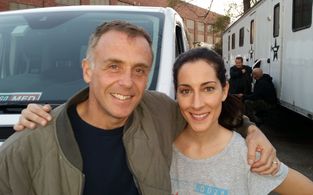 Amanda Marcheschi (Nurse Dina) and David Eigenberg (Fireman Herrmann) on set of Chicago Med.