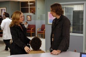 Erika Christensen, Dax Shepard, and Tyree Brown in Parenthood (2010)