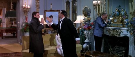 Peter Sellers, George Sanders, Martin Benson, and Tracy Reed in A Shot in the Dark (1964)