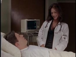 Carlos Jacott and Hunter Tylo in She Spies (2002)