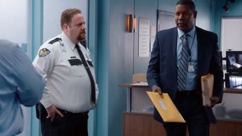 Phil (Ben Zelevansky) isn't sure whether to trust Bob Anderson (Dennis Haysbert) on 