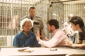 Robert Downey Jr., Woody Harrelson, Louis Lombardi, and Terrylene in Natural Born Killers (1994)