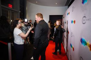 Director Zach Meiners being interviewed on the red carpet of Conversion's NYC Premiere