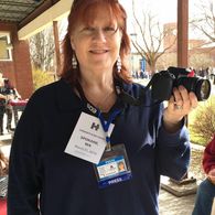 Taking stills at the Former President Clinton's rally Spokane Community College