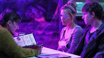 Liza Weil, Kyle Gallner, and Johnny Berchtold in The Passenger (2023)