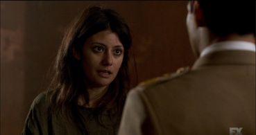 Sibylla Deen and Keon Alexander in Tyrant (2014)