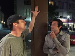 Having a conversation with Director Gary Lundgren on the set of Concrete Canvas