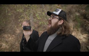 Still frame from Amityville Bigfoot.