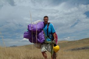 Free Falling; Keith Neubert sticks the landing thanks to parachute instructor Bill Laurence.