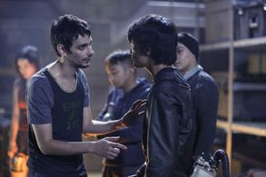 Christopher Larkin and Devon Bostick in The 100 (2014)