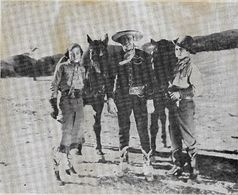 Gene Autry, Frankie Darro, and Betsy King Ross in Men with Steel Faces (1940)