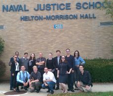 Mark Lund (second from right) at the Naval Justice School in October 2017. Lund played an NCIS Special Agent and managed
