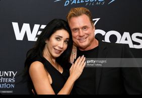 Actor John David Gregory with wife Debra Tiesi Gregory at Premier of The Prey, Legend of Karnoctus