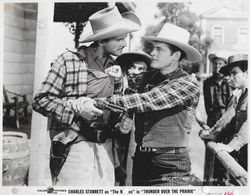 Ray Bennett, Cliff Edwards, Cal Shrum, Charles Starrett, and Cal Shrum and His Rhythm Rangers in Thunder Over the Prairi