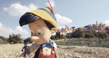 Joseph Gordon-Levitt and Benjamin Evan Ainsworth in Pinocchio (2022)