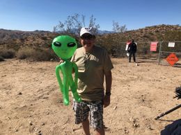 Co-writer/producer Mark Cerulli with a Little Green Man prop on the set of AREA 5150, Morongo Valley, CA.