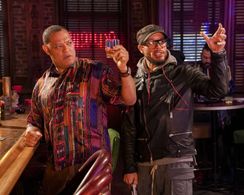 Directing Laurence Fishburne on the set of Black-ish