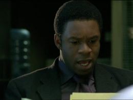 Wil Johnson in Waking the Dead (2000)