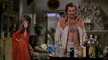 Burt Reynolds and Anitra Ford in The Longest Yard (1974)