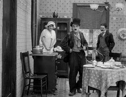 Charles Chaplin, Billy Armstrong, and Marta Golden in Work (1915)