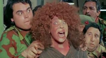 Rita Di Lernia, Renzo Montagnani, and Alvaro Vitali in The Soldier with Great Maneuvers (1978)