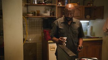 Nelsan Ellis in Elementary (2012)