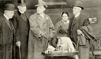 Robert Brower and Ben F. Wilson in The Mystery of the Talking Wire (1914)