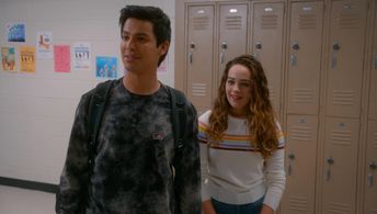 Mary Mouser and Xolo Maridueña in Cobra Kai: The Good, The Bad, and the Badass (2021)