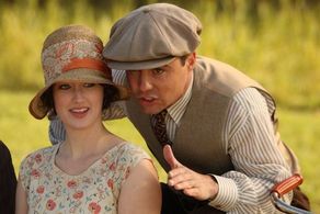 Rose (Ashley Johnson) and Charles (Nathan West) in the stands watching the Dayton Miners high school baseball team.
