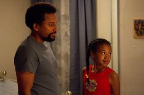 Troi Zee and Hill Harper on the set of 1982