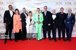 Olly Alexander (centre),Russell T Davies, Nicola Shindler and the cast and crew of It's A Sin in the press room after w